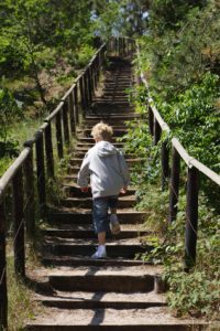 Boy on endless steps